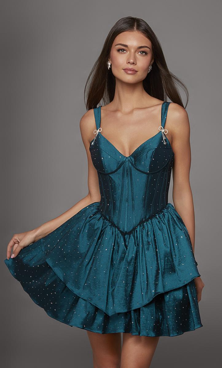 A stunning teal dress featuring a fitted bodice with delicate embellishments and a flared, layered skirt. Perfect for prom, homecoming, or a gala, this elegant piece is conveniently located near Apex, Cary, and Raleigh.