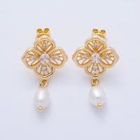 Elegant gold flower filigree earrings feature intricate detailing and a pearl drop, making them perfect for special occasions like weddings, proms, or galas. Ideal for adding a touch of sophistication to any outfit.