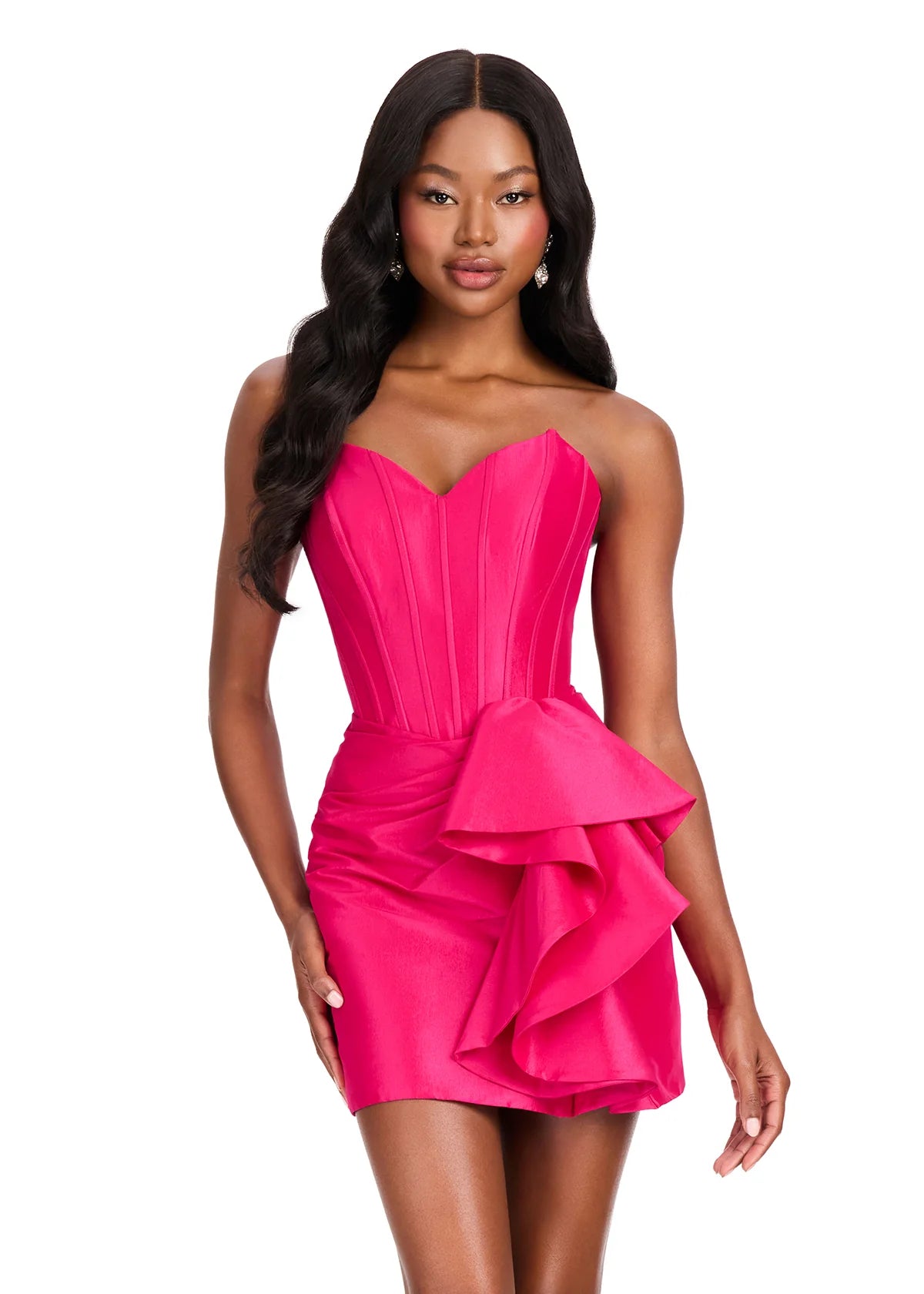 A model showcases a stunning fuchsia cocktail dress featuring a sweetheart neckline and a dramatic side ruffle. Perfect for special occasions like prom, homecoming, or a gala, this dress is conveniently located near Apex, Cary, and Raleigh.