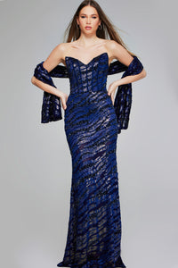 A model showcases a stunning navy strapless mermaid gown adorned with shimmering sequins, perfect for elegant events like galas or black tie weddings. This eye-catching dress is conveniently located near Apex, Cary, and Raleigh.