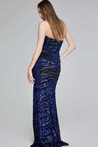 A woman is shown from the back wearing a stunning strapless navy gown with a shimmering mermaid silhouette, ideal for events like a gala or black tie wedding. This elegant dress is conveniently located near Apex, Cary, and Raleigh.