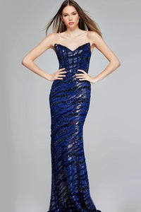 A model poses in a stunning navy strapless mermaid gown adorned with intricate sequin detailing, perfect for formal occasions such as galas or black tie weddings.
