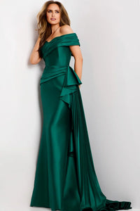 A model showcases a stunning emerald green floor-length gown with an off-the-shoulder sweetheart neckline and elegant draping.