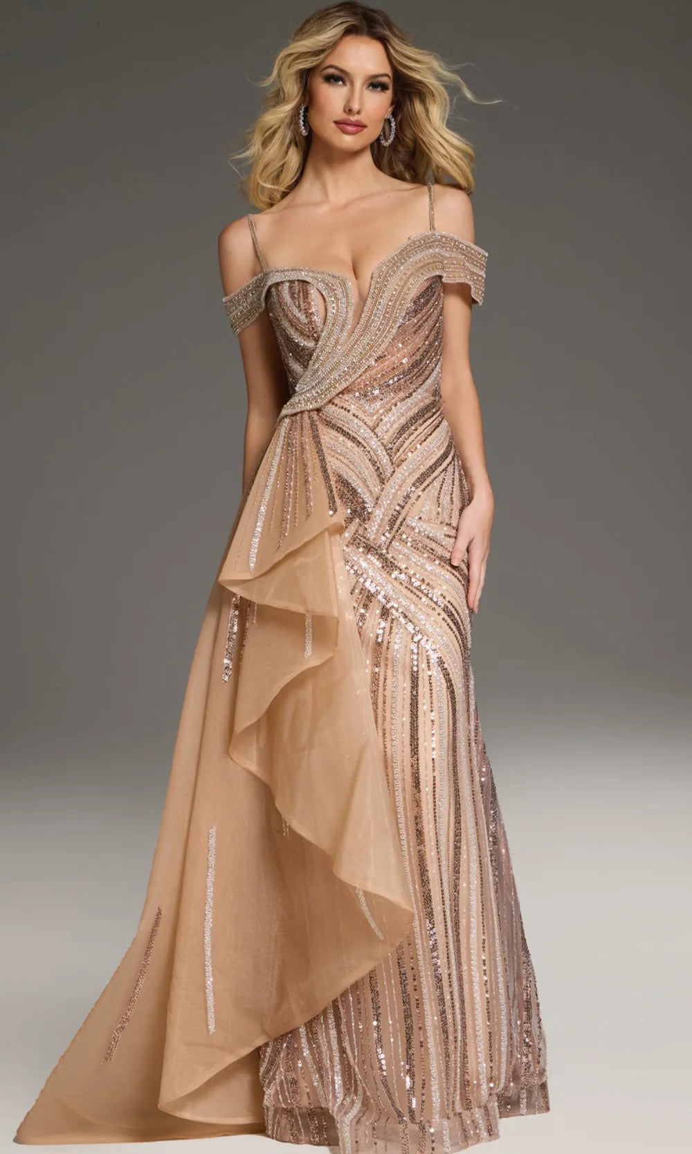 A stunning champagne evening gown featuring an off-the-shoulder design, intricate beading, and a flowing layered skirt. Perfect for formal events like galas, black tie weddings, or proms, and available near Apex, Cary, and Raleigh.