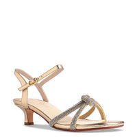 A stylish strappy sandal featuring a 1.75-inch kitten heel and adorned with shimmering glitter accents. Perfect for special occasions like gala events or black tie weddings, conveniently located near Apex, Cary, and Raleigh.