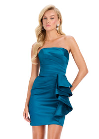 A model showcases a stunning teal strapless mini dress featuring a ruched bodice and a cascading ruffle on one side.