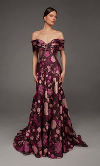 A model showcases an elegant off-the-shoulder gown adorned with vibrant floral patterns in shades of purple and pink.