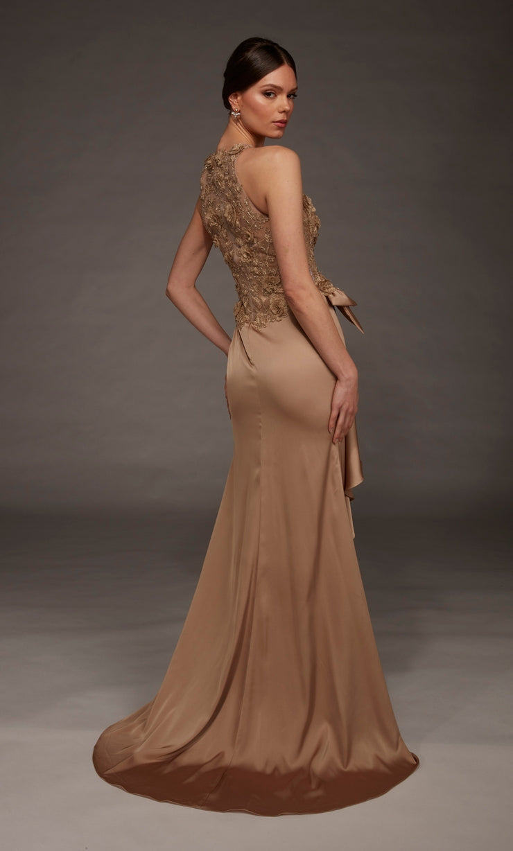 A model showcases an elegant gown featuring a detailed beaded bodice and a flowing, satin skirt in a warm antique gold shade.