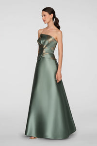 A model showcases a stunning soft sage ball gown with metallic jacquard folds and gold floral details, perfect for elegant occasions like mother of the bride, prom, or black tie weddings.