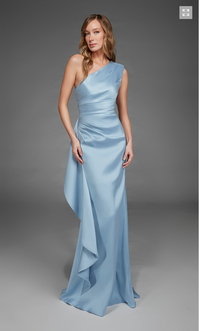 A model poses in an elegant one-shoulder gown in a soft glacier blue color, featuring a flowing silhouette and draped detailing.