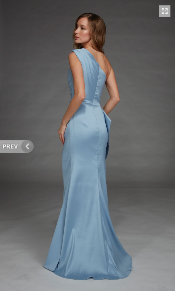 A model showcases a stunning glacier blue gown with a fitted silhouette and a dramatic one-shoulder design.