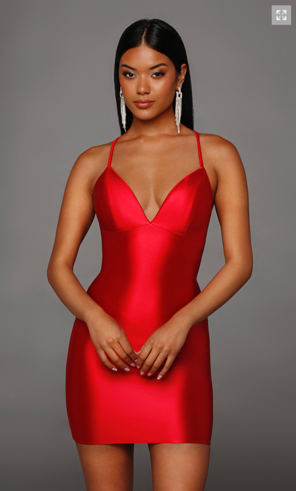 A model poses confidently in a sleek, red satin mini dress with thin straps and a plunging neckline. This stylish dress is perfect for date nights, birthday parties, or prom events, conveniently located near Apex, Cary, and Raleigh.
