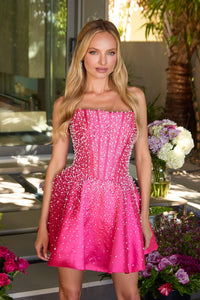 A model poses in a vibrant pink mini dress adorned with shimmering beads, featuring a structured strapless bodice.