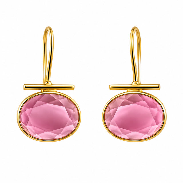 Elegant gold-tone earrings featuring a large, faceted pink gemstone, designed with a modern drop silhouette. Perfect for special occasions like weddings, proms, or galas, these earrings add a touch of sophistication to any outfit.