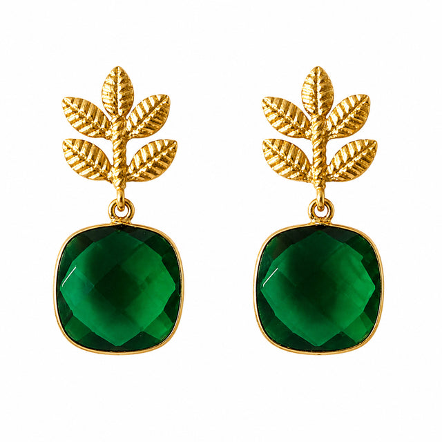 Gold leaf design earrings featuring a vibrant green faceted stone, perfect for adding a touch of elegance to special occasions like weddings, galas, or proms. Ideal for those in Apex, Cary, and Raleigh looking for stylish accessories.